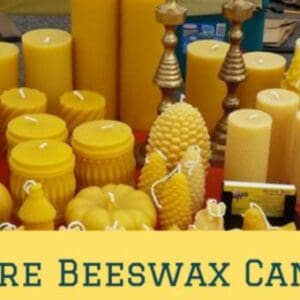 Selection of PURE BEESWAS CANDLES FROM A TRUSTED SOURCE displayed on a market table.